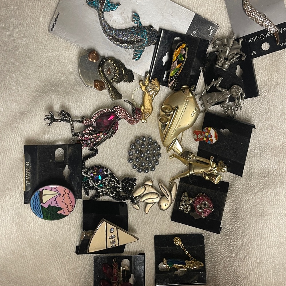 Elegant Silver and Gold Brooch Collection
